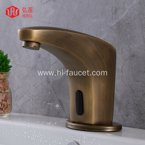 Countertop mounted sensor touches bathroom sink faucet